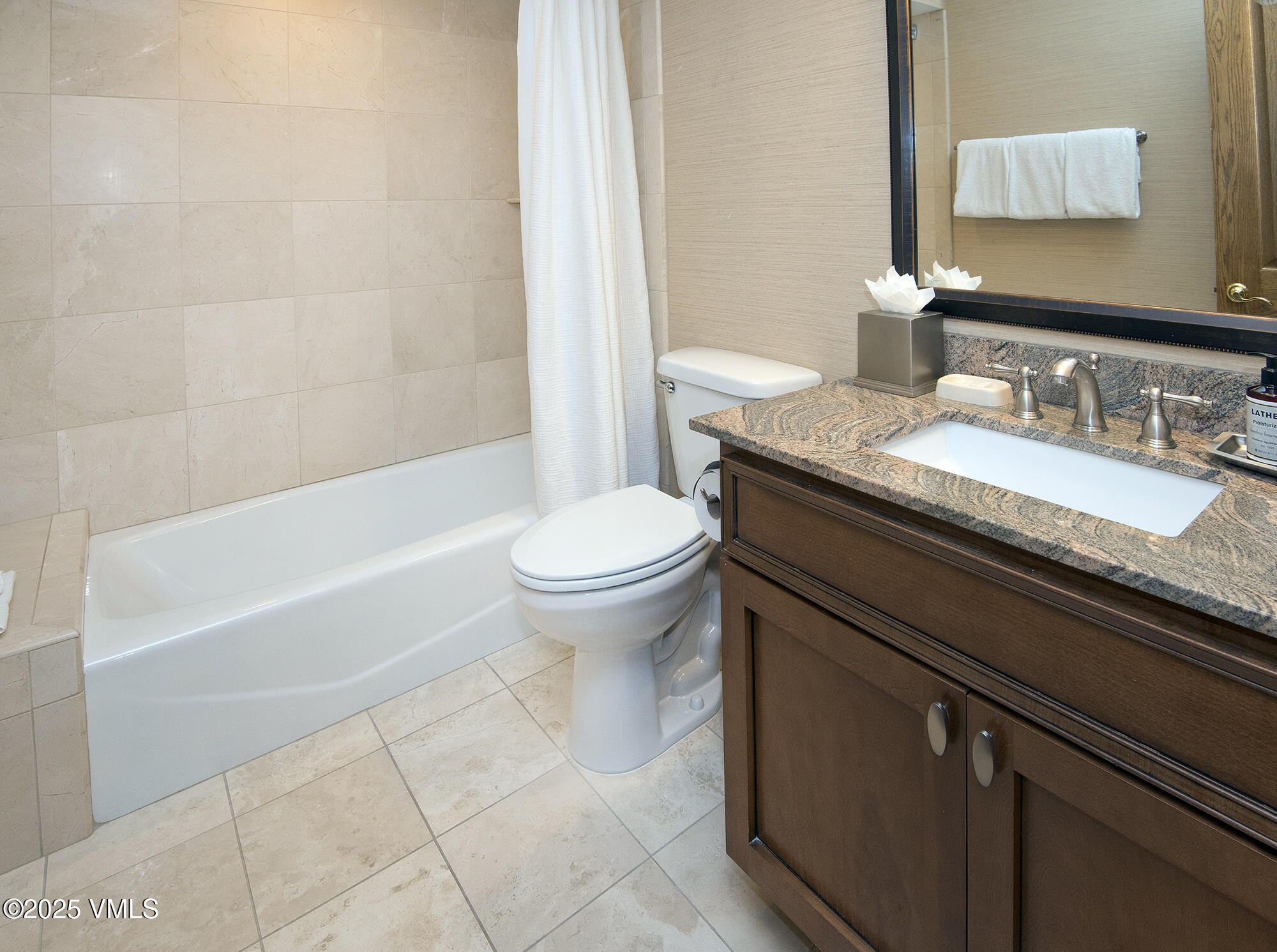 210 Offerson Road Beaver Creek, CO 81620 - Photo 30 of 30 a bathroom with a granite countertop toilet a sink and a bathtub