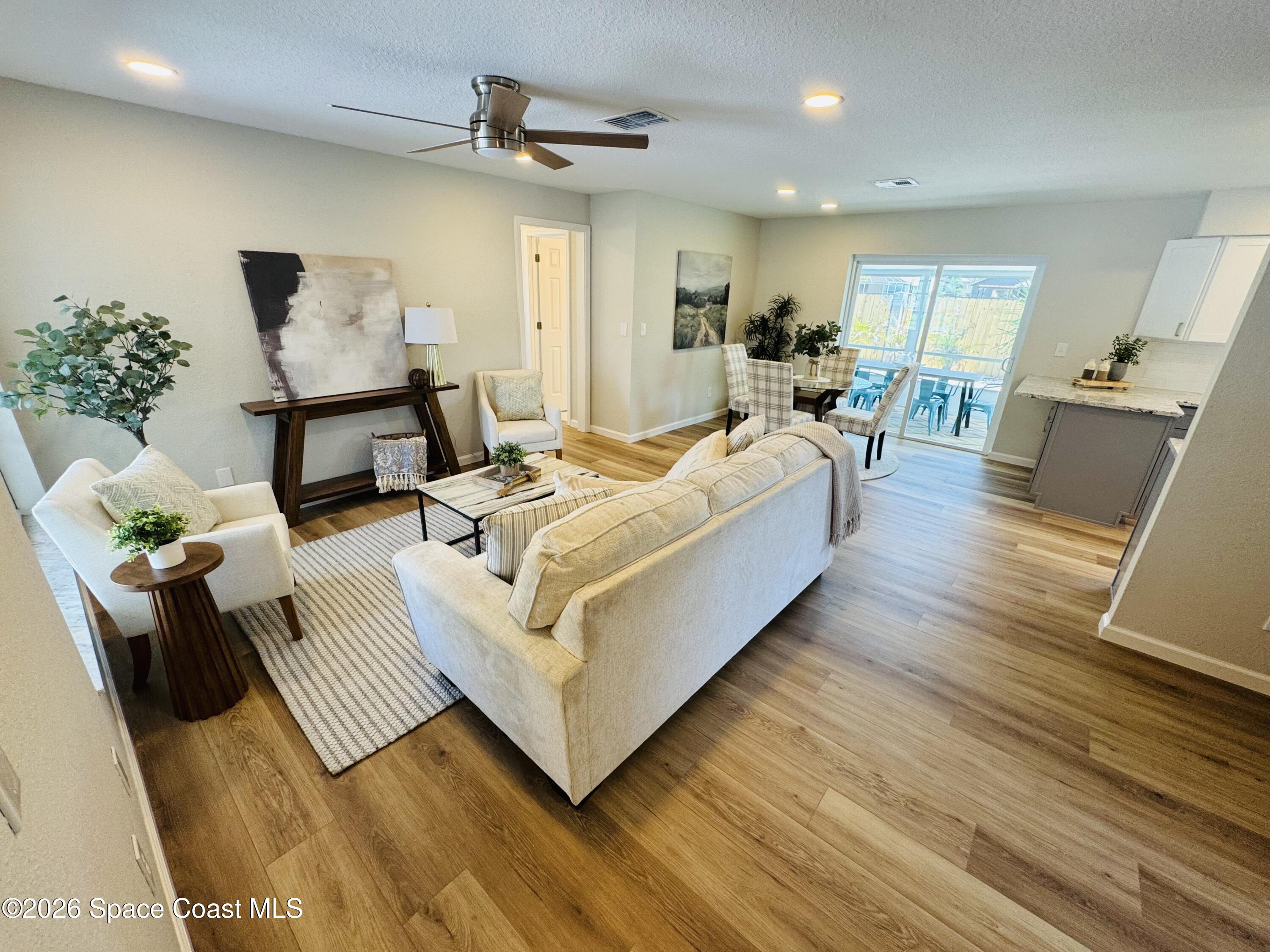 1910 Tallridge Road Melbourne, FL 32935 - Photo 6 of 34 Living room from entry