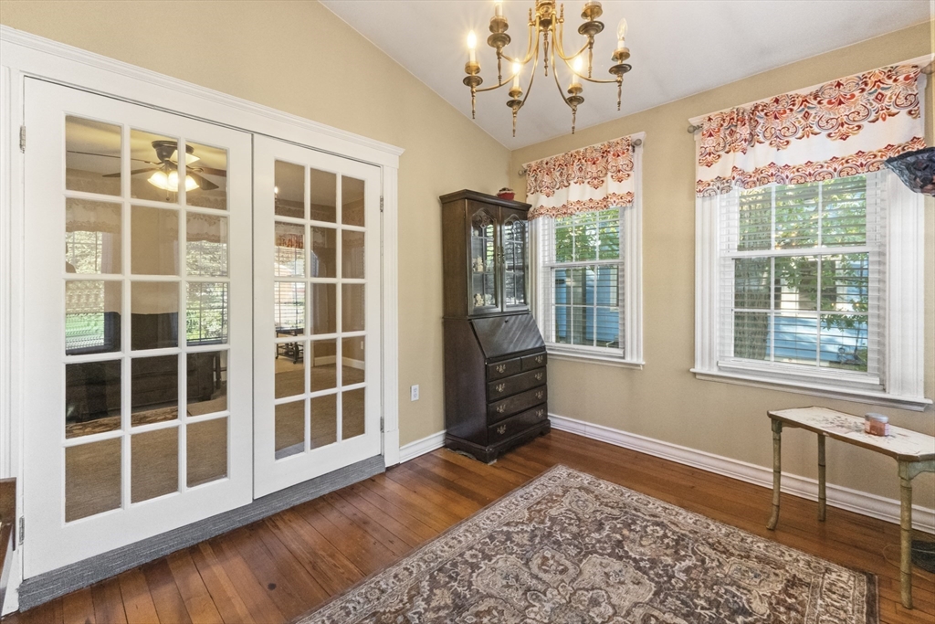 36 Forest Street Peabody, MA 01960 - Photo 11 of 35 a view of a livingroom with wooden floor and windows