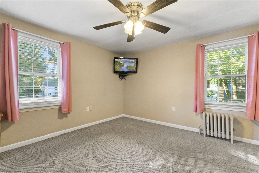 36 Forest Street Peabody, MA 01960 - Photo 22 of 35 a view of an empty room with a window