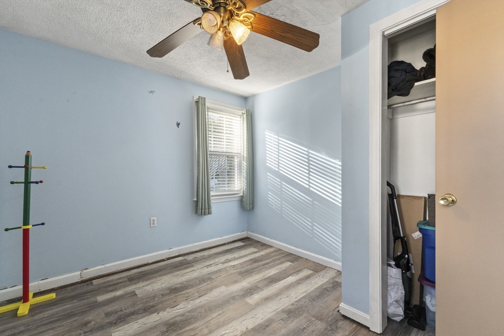 36 Forest Street Peabody, MA 01960 - Photo 24 of 35 a view of empty room with wooden floor