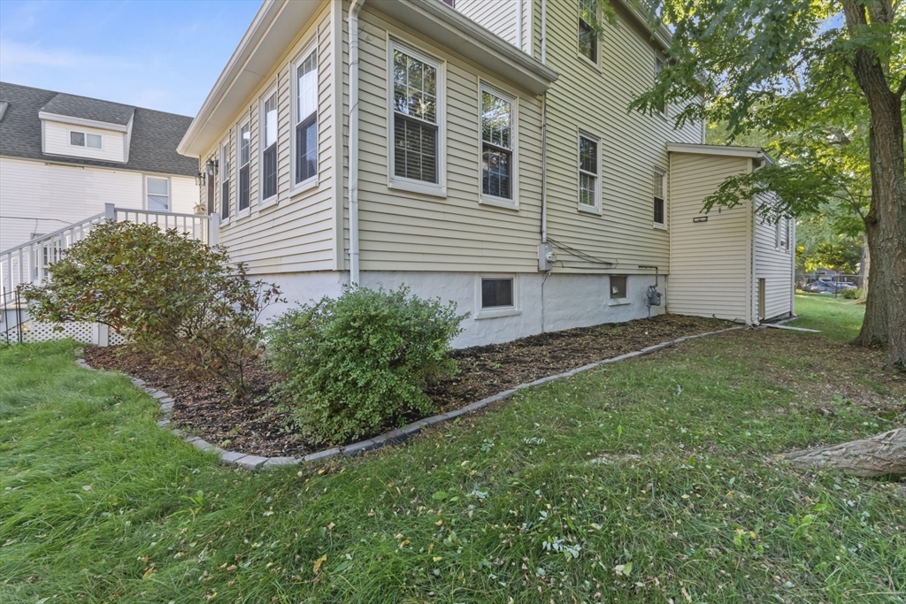 36 Forest Street Peabody, MA 01960 - Photo 29 of 35 a view of a house with a yard