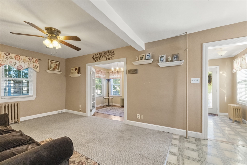 36 Forest Street Peabody, MA 01960 - Photo 6 of 35 a living room with furniture and windows