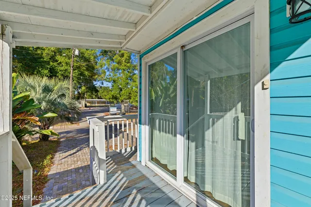 a view of balcony with furniture