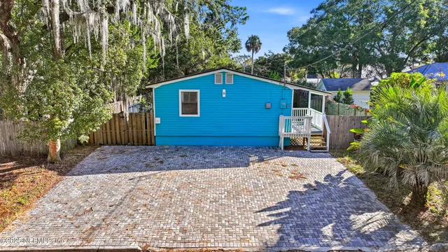 a house view with a backyard space