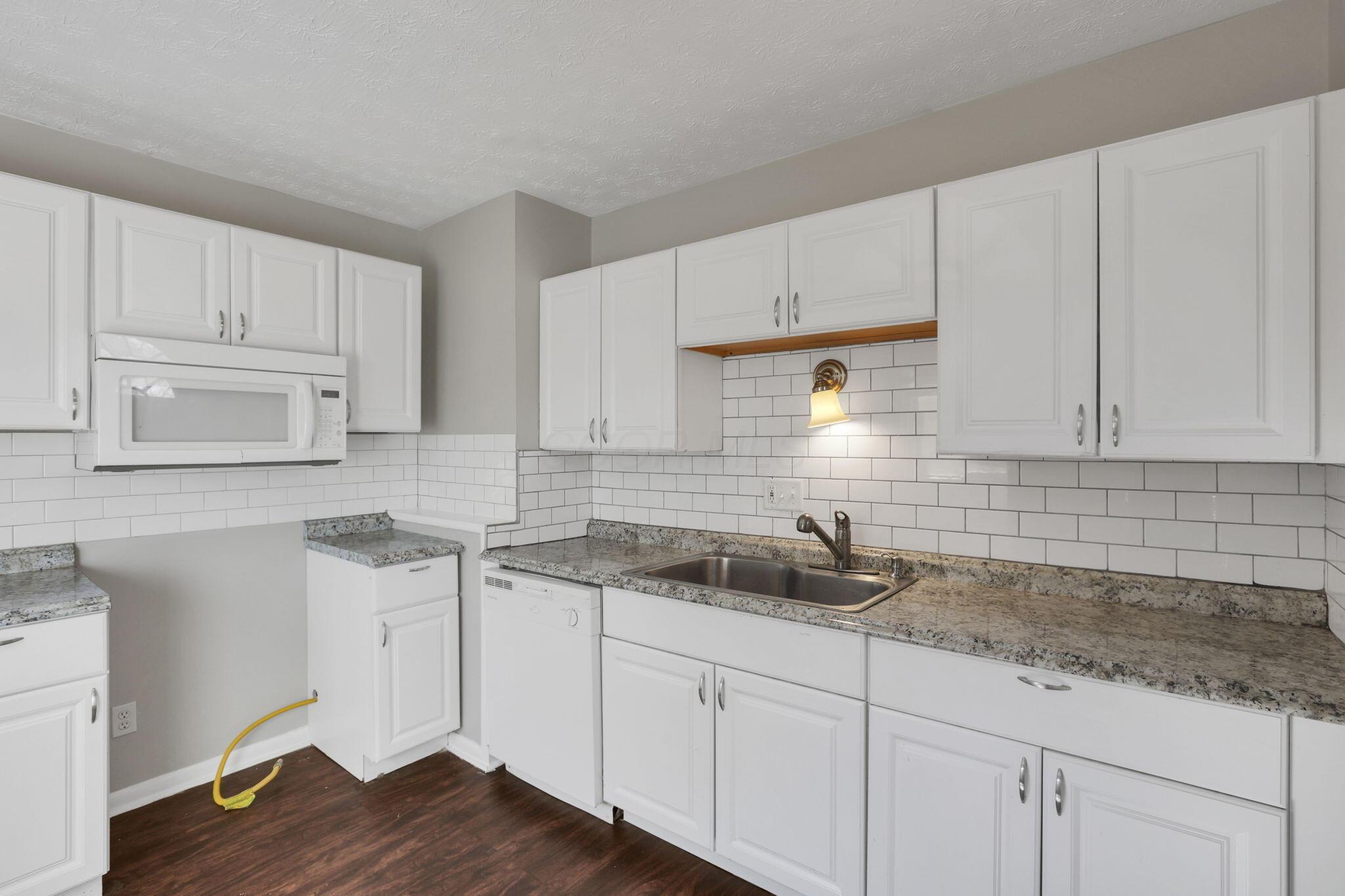 1865 Agler Road, Unit 1867 Columbus, OH 43224 - Photo 7 of 37 6-web-or-mls-G02A6053