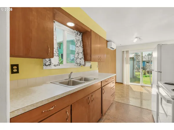 a bathroom with a sink and a bathtub