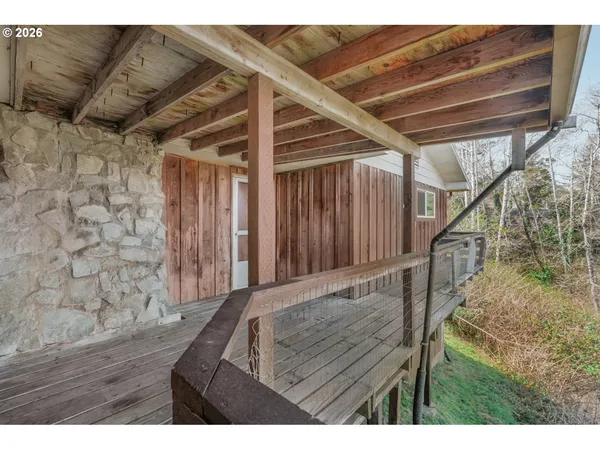a view of a house with yard and a garden