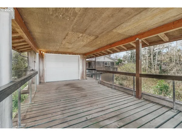 an aerial view of houses with yard