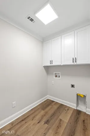 a front view of house with yard and garage