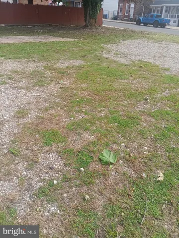a view of a yard with an outdoor space