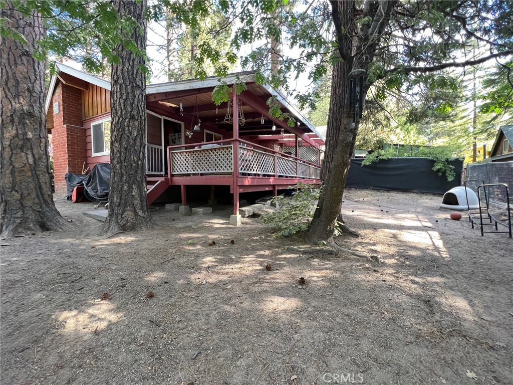 2551 Spring Drive Running Springs, CA 92382 - Photo 12 of 15 a view of a house with a yard