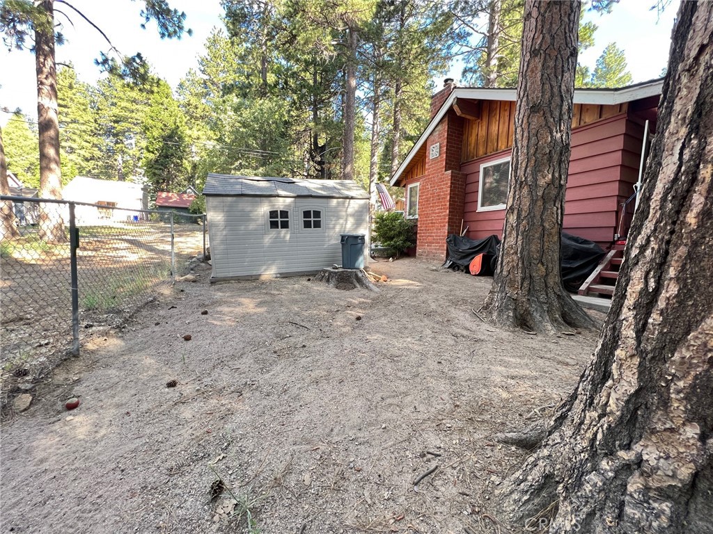 2551 Spring Drive Running Springs, CA 92382 - Photo 14 of 15 a view of a house with backyard and sitting area