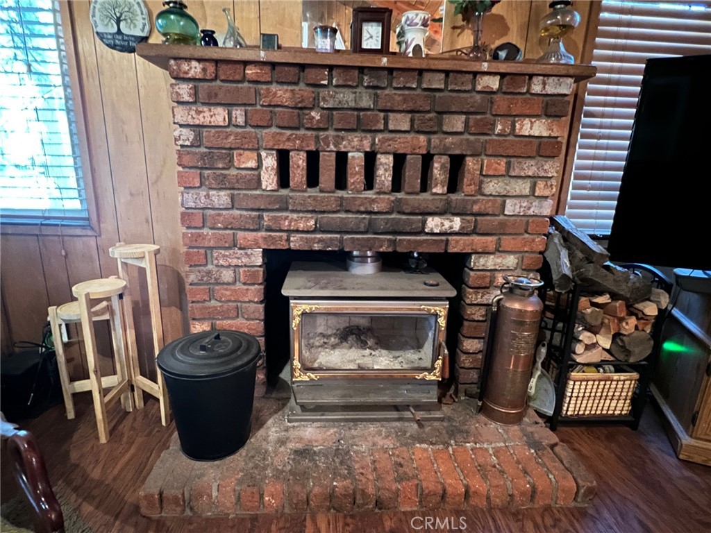 2551 Spring Drive Running Springs, CA 92382 - Photo 5 of 15 a stove top oven sitting inside of a kitchen