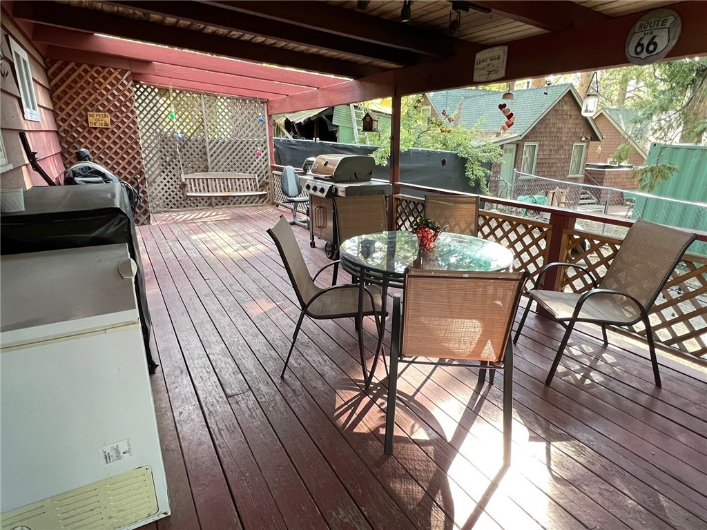 2551 Spring Drive Running Springs, CA 92382 - Photo 10 of 15 a view of balcony with furniture and wooden deck