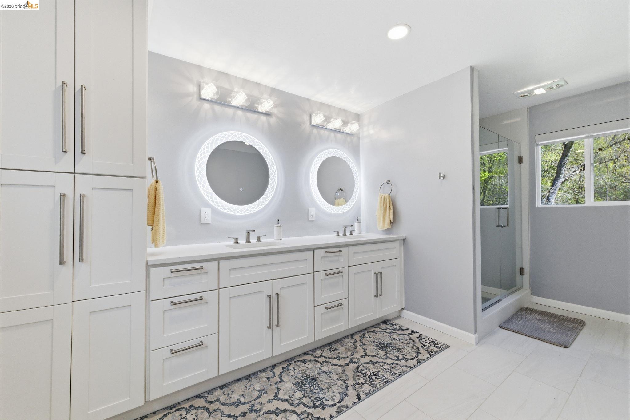 18389 Woodham Carne Road Sonora, CA 95370 - Photo 13 of 29 Full bathroom with double vanity, a shower stall, and recessed lighting