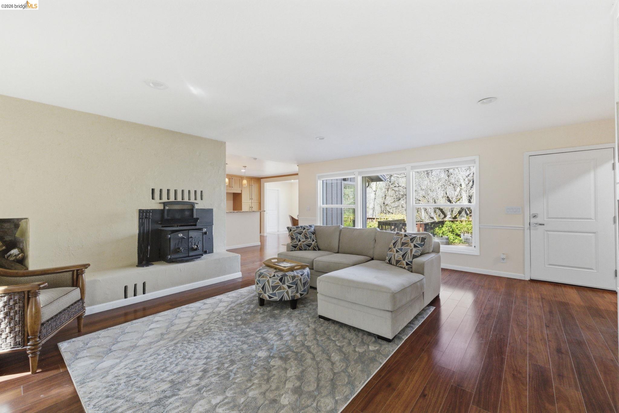 18389 Woodham Carne Road Sonora, CA 95370 - Photo 8 of 29 Living room with dark wood-style flooring