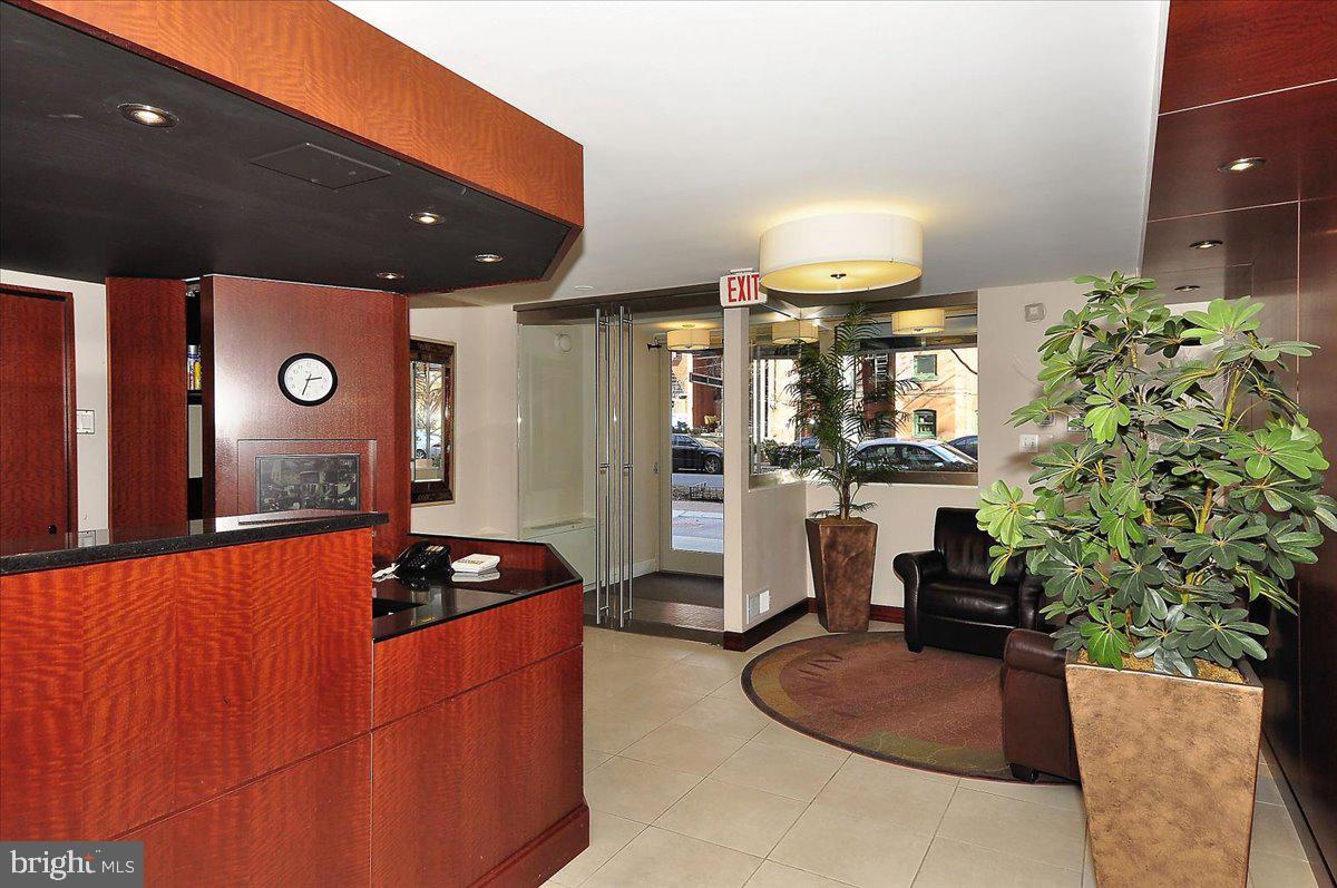 1260 21st Street Northwest, Unit 111 Washington, DC 20036 - Photo 21 of 33 Modern lobby with inviting ambiance.