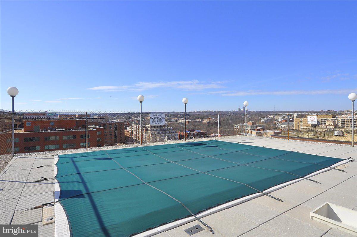 1260 21st Street Northwest, Unit 111 Washington, DC 20036 - Photo 23 of 33 Rooftop oasis with city skyline views.