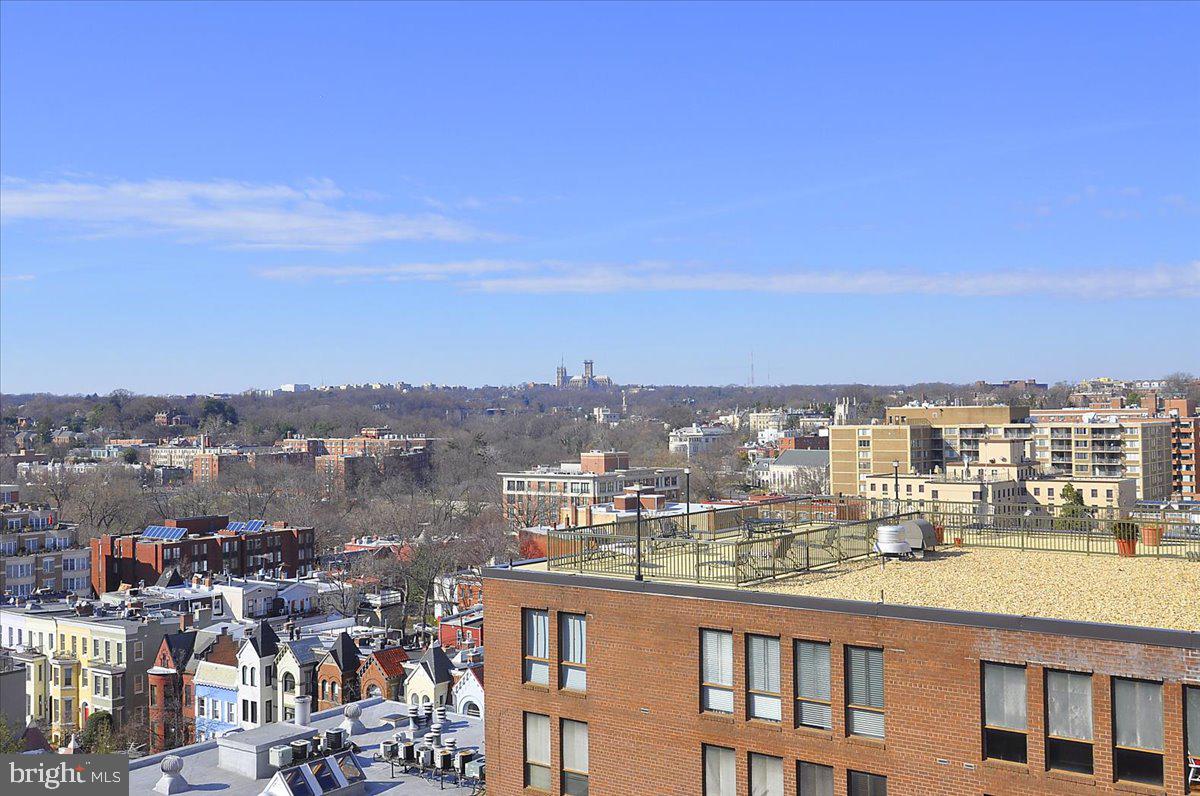 1260 21st Street Northwest, Unit 111 Washington, DC 20036 - Photo 24 of 33 Urban skyline meets serene nature.