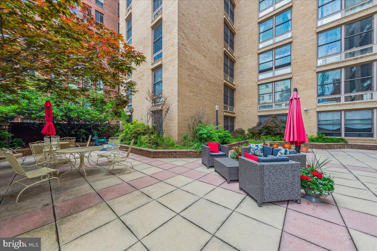 1260 21st Street Northwest, Unit 111 Washington, DC 20036 - Photo 26 of 33 Urban oasis with vibrant greenery.