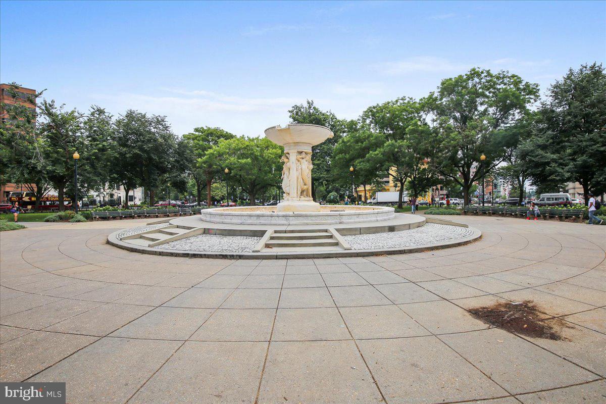 1260 21st Street Northwest, Unit 111 Washington, DC 20036 - Photo 29 of 33 Tranquil park with a central fountain.