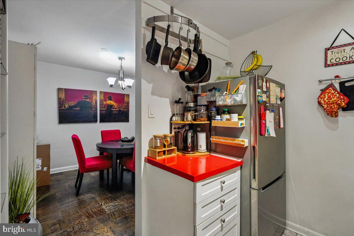 1260 21st Street Northwest, Unit 111 Washington, DC 20036 - Photo 8 of 33 Charming kitchen with vibrant accents.