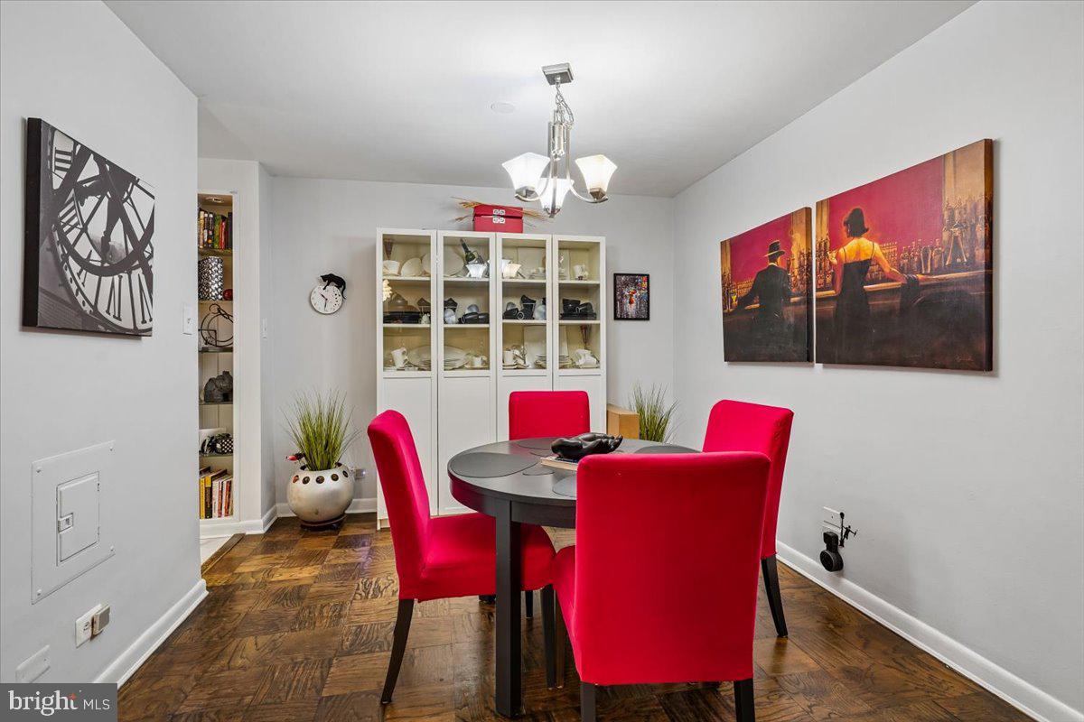 1260 21st Street Northwest, Unit 111 Washington, DC 20036 - Photo 10 of 33 Chic dining space with vibrant accents.