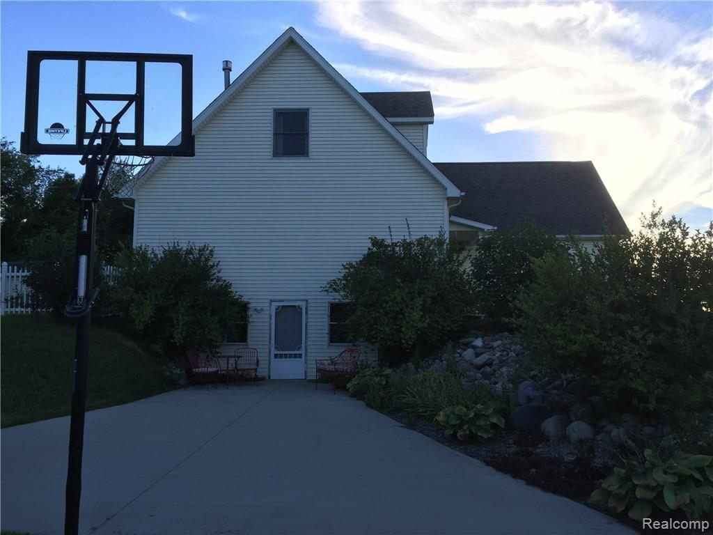 4678 Willis Road North Branch, MI 48461 - Photo 27 of 41 Walk Out Basement and Basketball Play Area