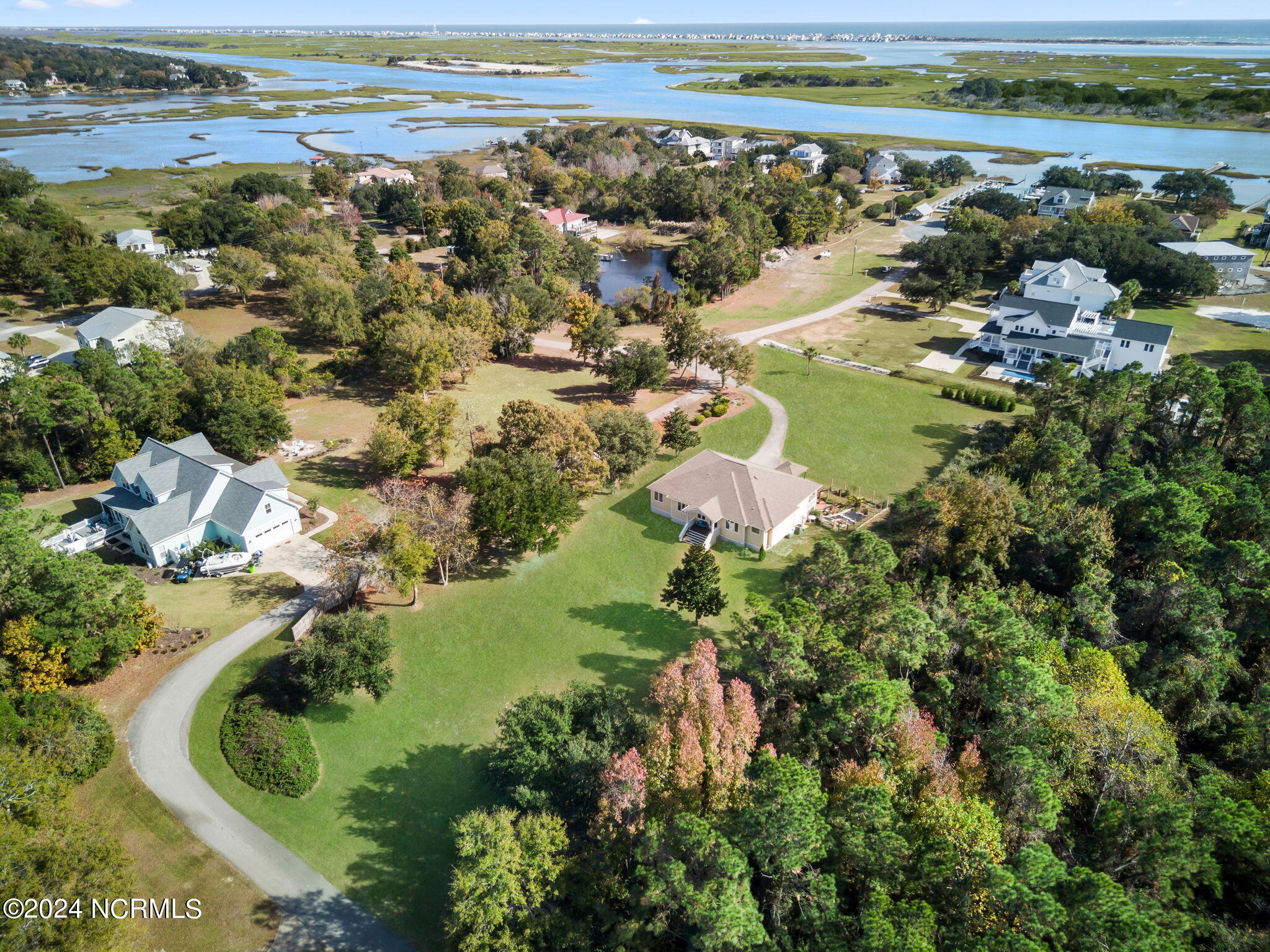 Wow! The ICW is right there. Enjoy the boat ramp to put in your boat, kayak, SUP. Yes all that land around the house is yours!