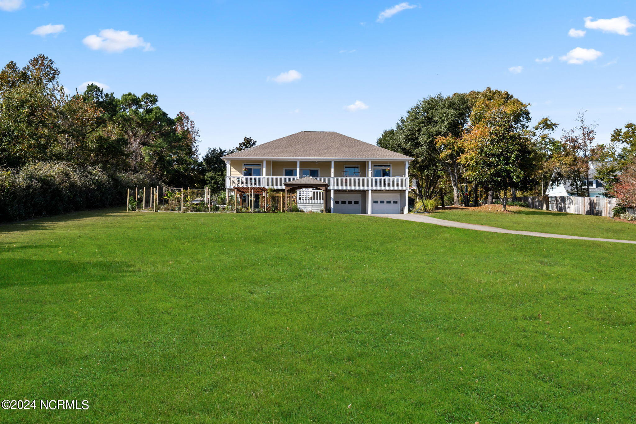 110 Waterway Trail Hampstead, NC 28443 - Photo 51 of 60 What a yard! Enjoy a game of soccer, football or your pup would love a place to run