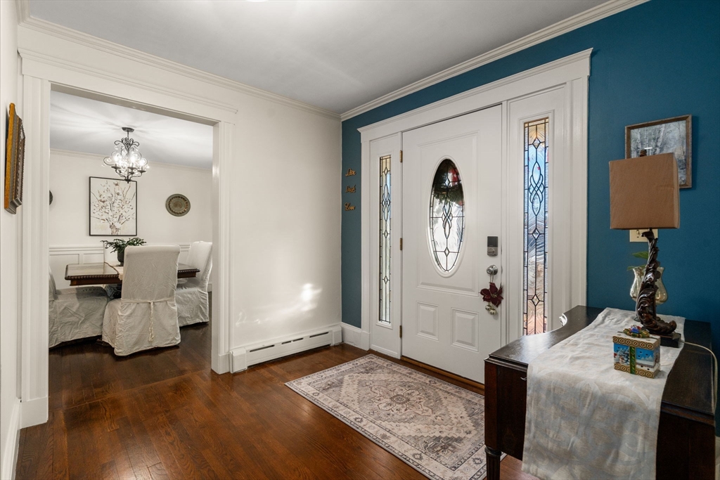 193 Garden Street Needham, MA 02492 - Photo 3 of 39 a living room with furniture and a mirror