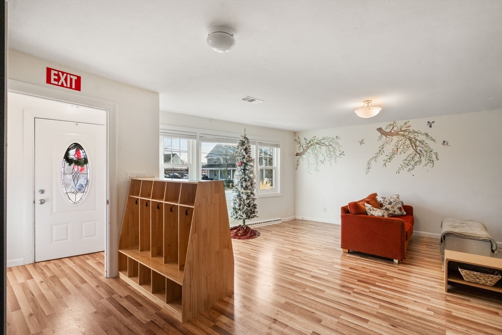 193 Garden Street Needham, MA 02492 - Photo 34 of 39 a living room with furniture and wooden floor
