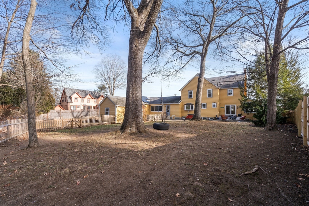 193 Garden Street Needham, MA 02492 - Photo 39 of 39 a view of a street with a large tree