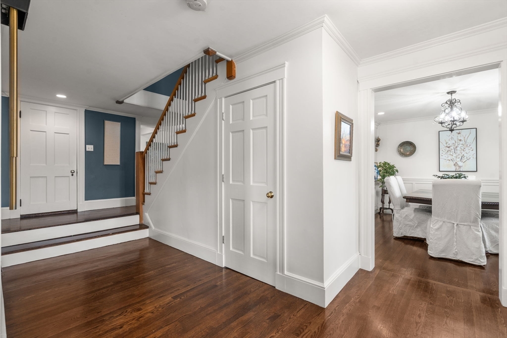 193 Garden Street Needham, MA 02492 - Photo 4 of 39 a view of a livingroom with wooden floor and entryway