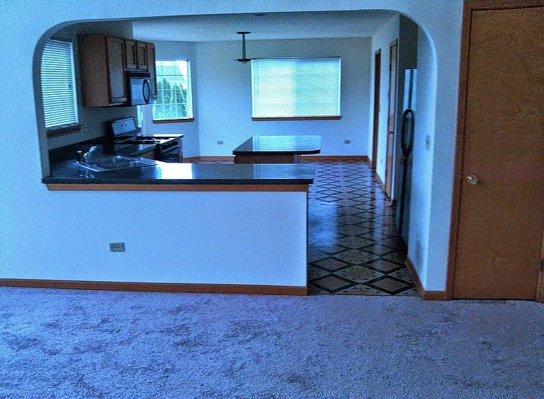 596 Farmview Court University Park, IL 60484 - Photo 11 of 14 a bathroom with mirror sink and window