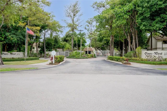 a view of a park with swings and slides