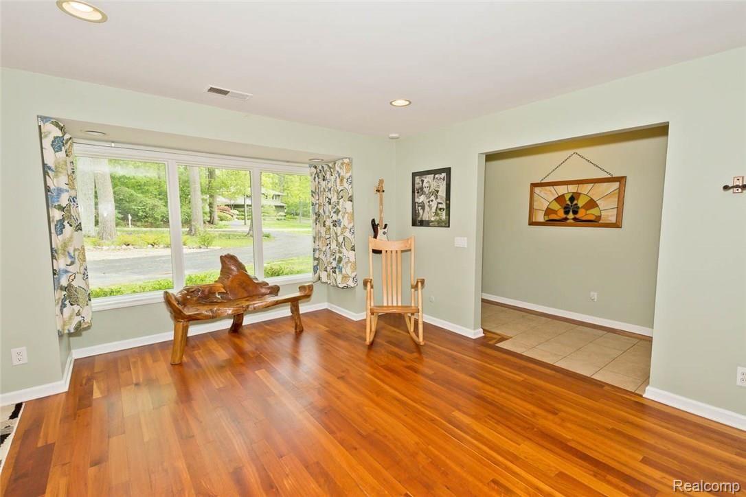 6145 Idlewyle Road Bloomfield Hills, MI 48301 - Photo 12 of 31 View from Living Room looking onto driveway and street. The home is setback and the feeling of privacy is complete.