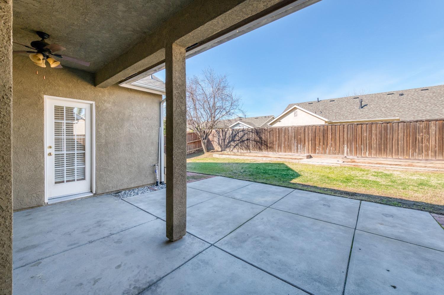 6580 East Raco Avenue Fresno, CA 93727 - Photo 25 of 30 a view of swimming pool with an outdoor space and seating area