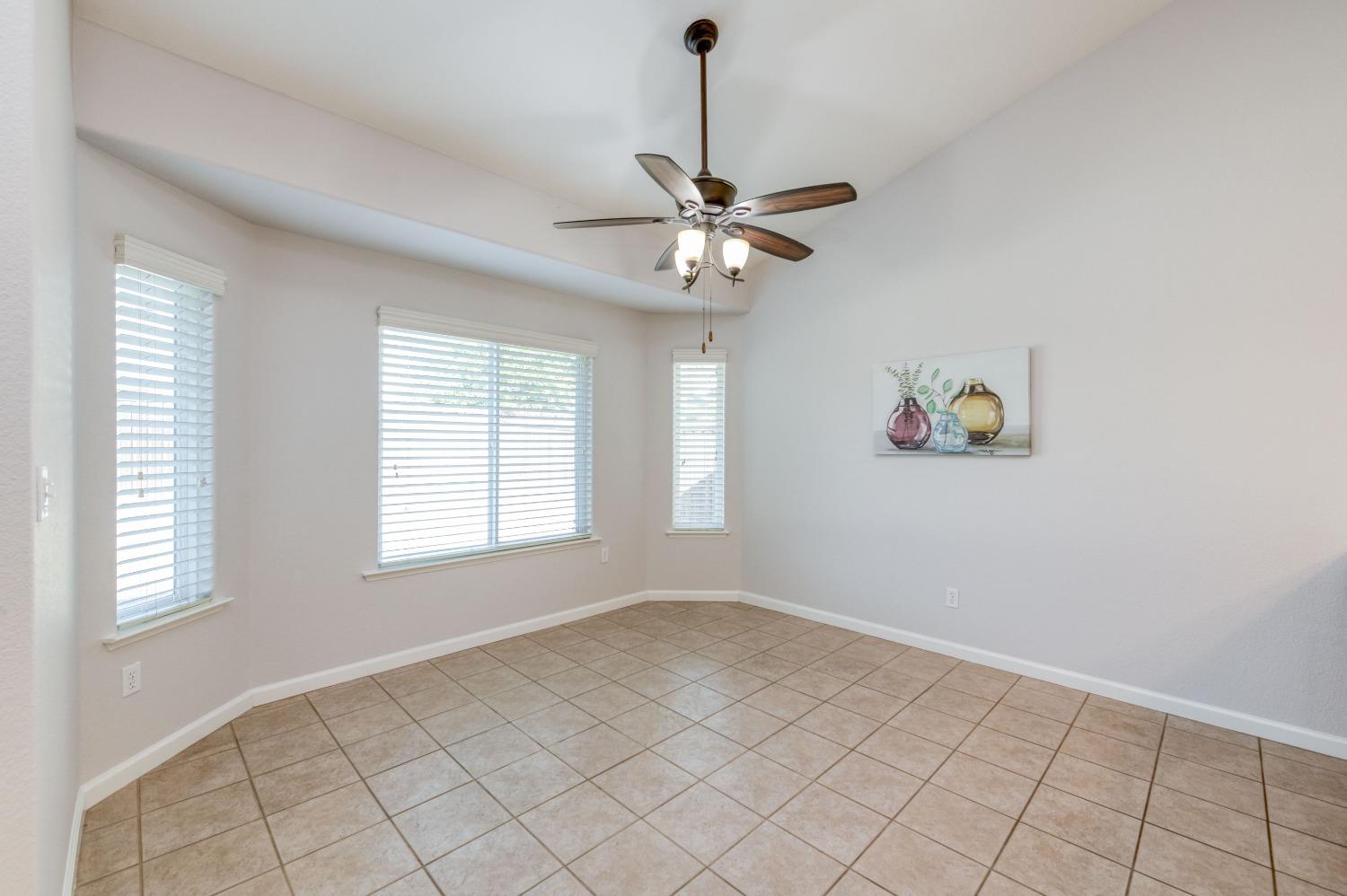 6580 East Raco Avenue Fresno, CA 93727 - Photo 9 of 30 a view of an empty room with a window