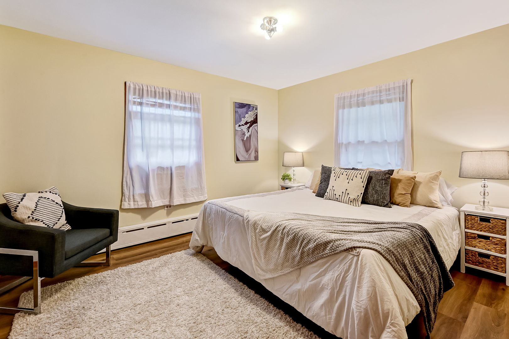 219 79th Street Burr Ridge, IL 60527 - Photo 11 of 28 a bedroom with a bed and a window