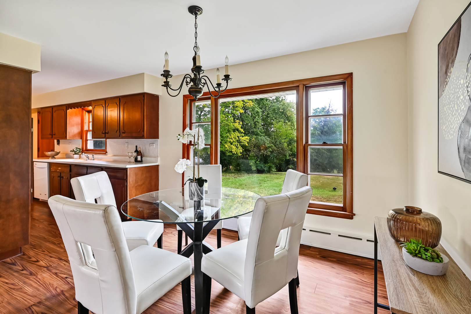 219 79th Street Burr Ridge, IL 60527 - Photo 7 of 28 a dining room with furniture window wooden floor