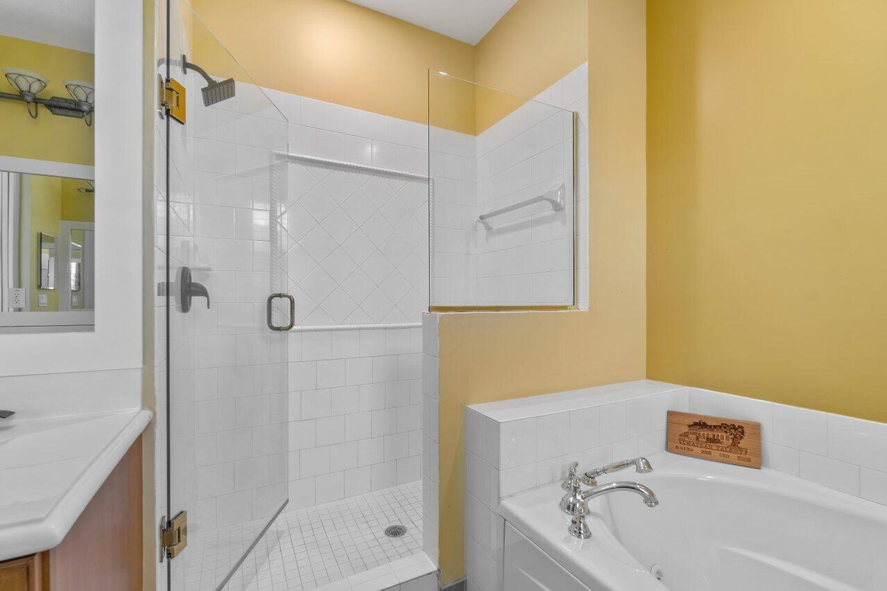 3805 Northwest 5th Terrace Boca Raton, FL 33431 - Photo 20 of 30 a bathroom with a tub and a shower