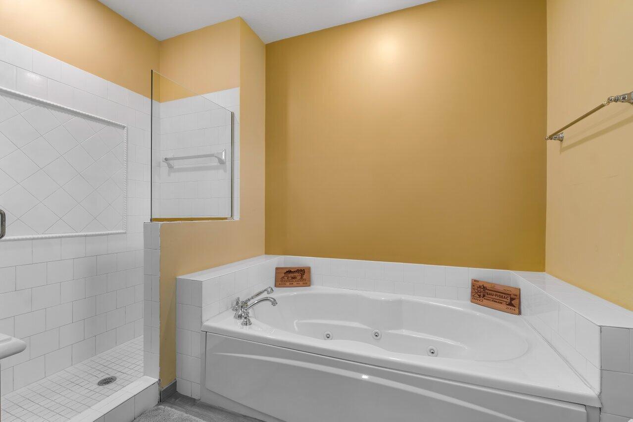 3805 Northwest 5th Terrace Boca Raton, FL 33431 - Photo 21 of 30 a bathroom with a bathtub