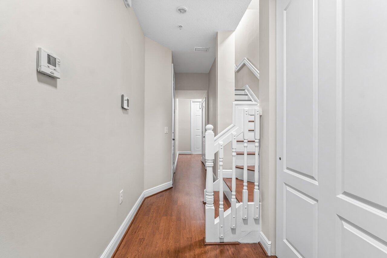 3805 Northwest 5th Terrace Boca Raton, FL 33431 - Photo 3 of 30 a view of a hallway with wooden floor and entryway