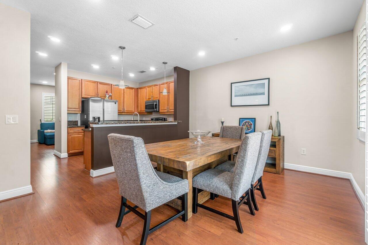 3805 Northwest 5th Terrace Boca Raton, FL 33431 - Photo 6 of 30 a view of a dining room with furniture and wooden floor