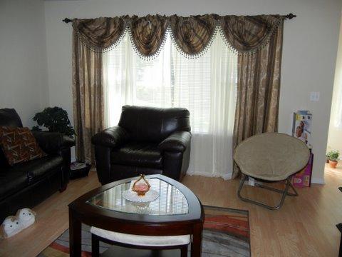 1020 Chaucer Court, Unit A Elgin, IL 60120 - Photo 4 of 10 a living room with furniture