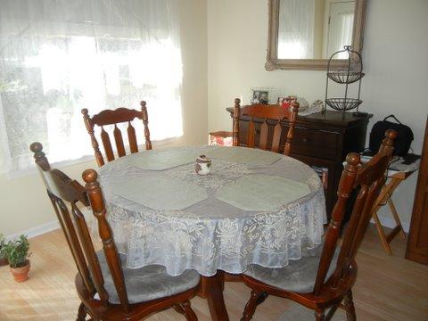 1020 Chaucer Court, Unit A Elgin, IL 60120 - Photo 7 of 10 a view of a dining room with furniture and wooden floor