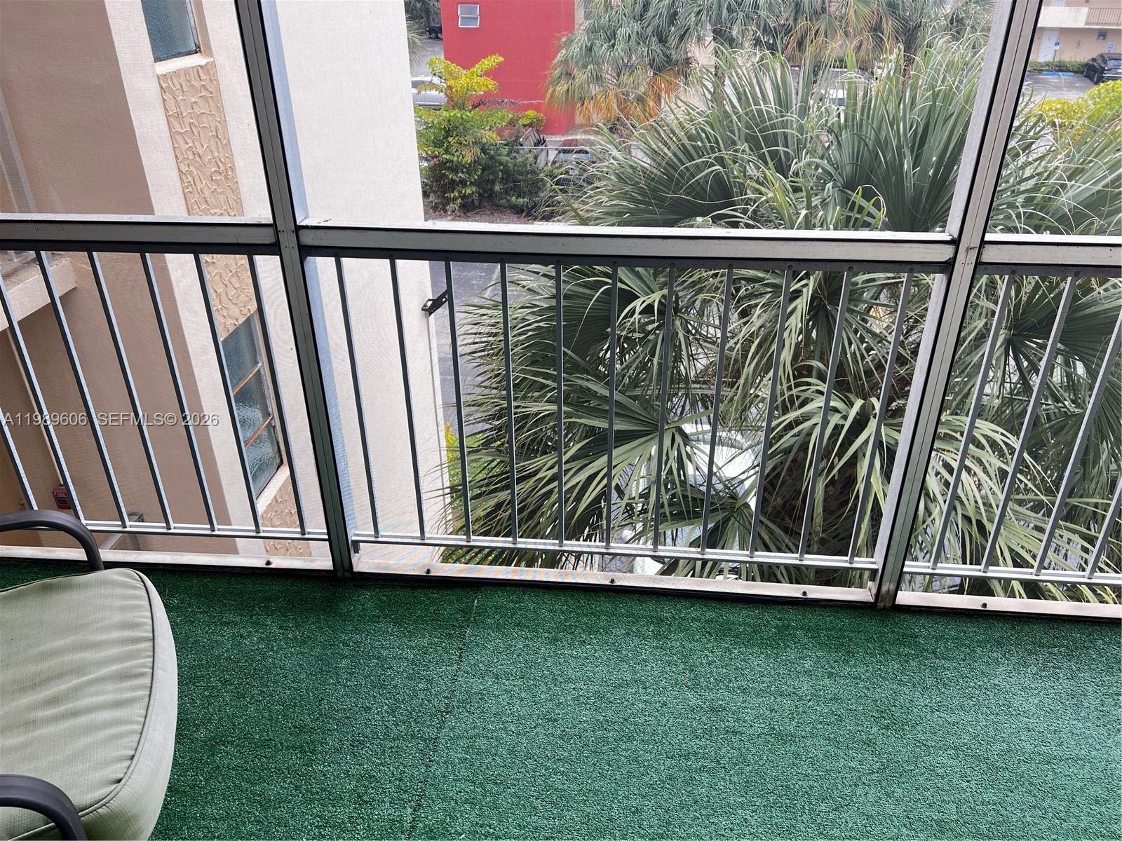 9159 Southwest 77th Avenue, Unit 311 Miami, FL 33156 - Photo 13 of 17 a view of a porch