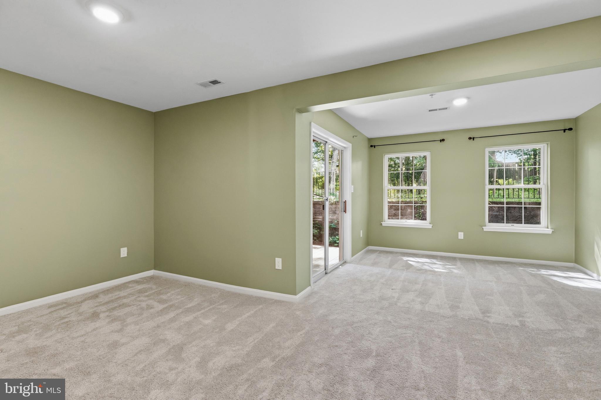 204 Tilden Way, Unit 204 Edgewater, MD 21037 - Photo 43 of 64 Large living space downstairs with natural light